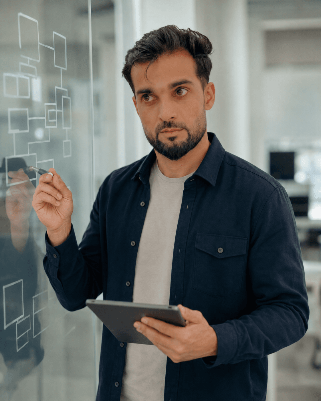Suhaib Qanooni in his software engineering workspace
